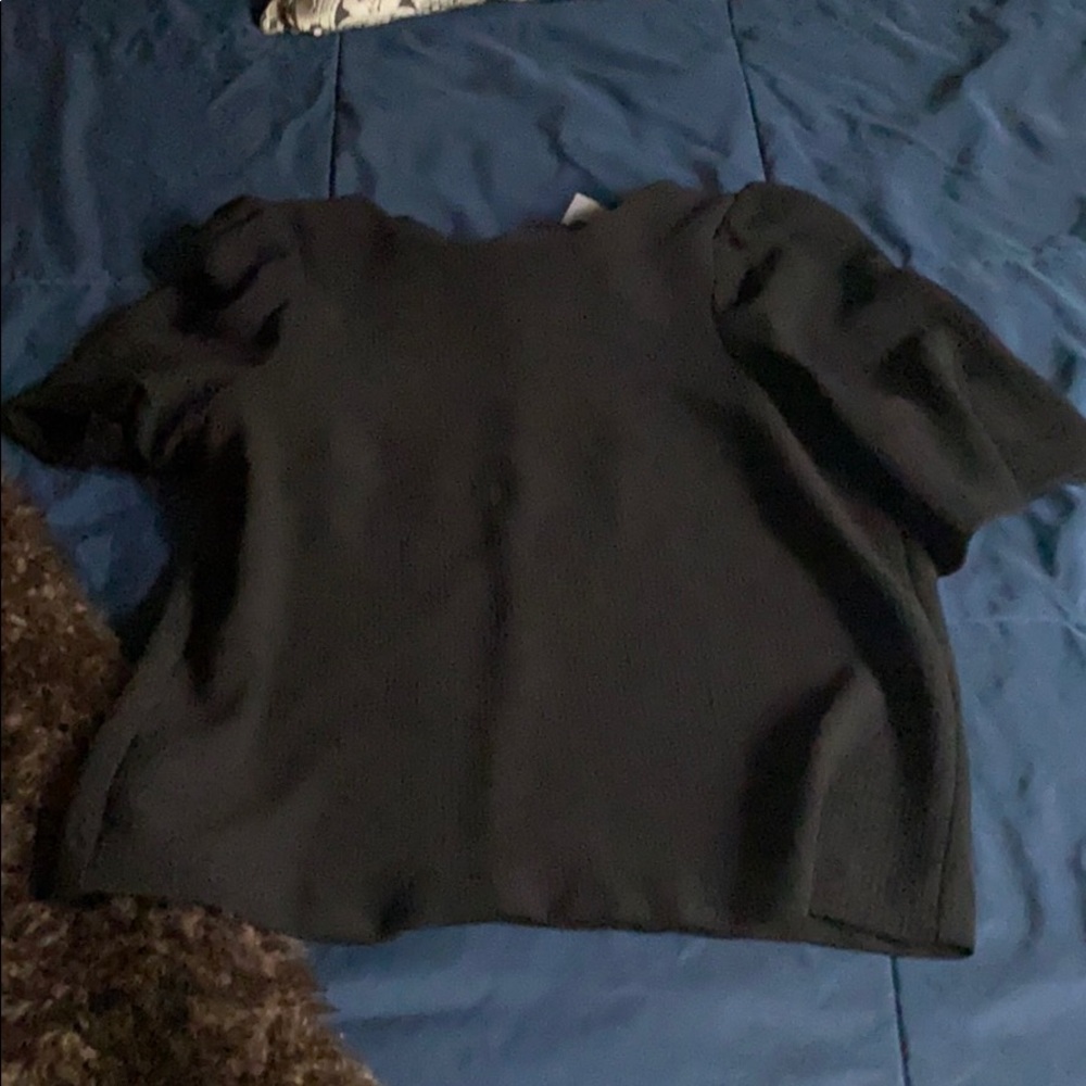 Flowy black shirt, shoulders textured